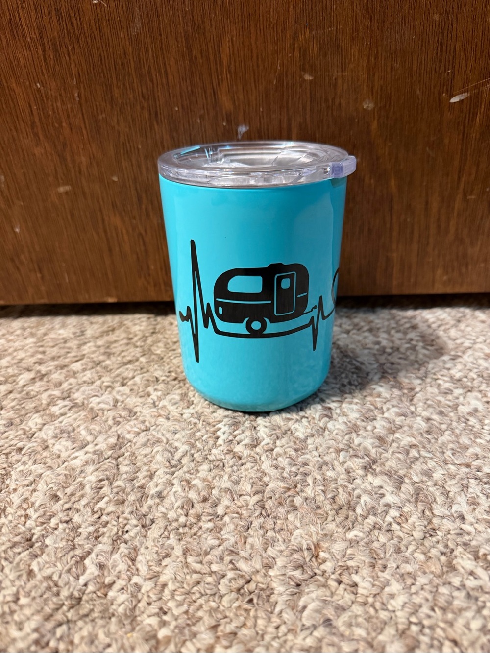 Corkcicle coffee tumbler with camper design.
